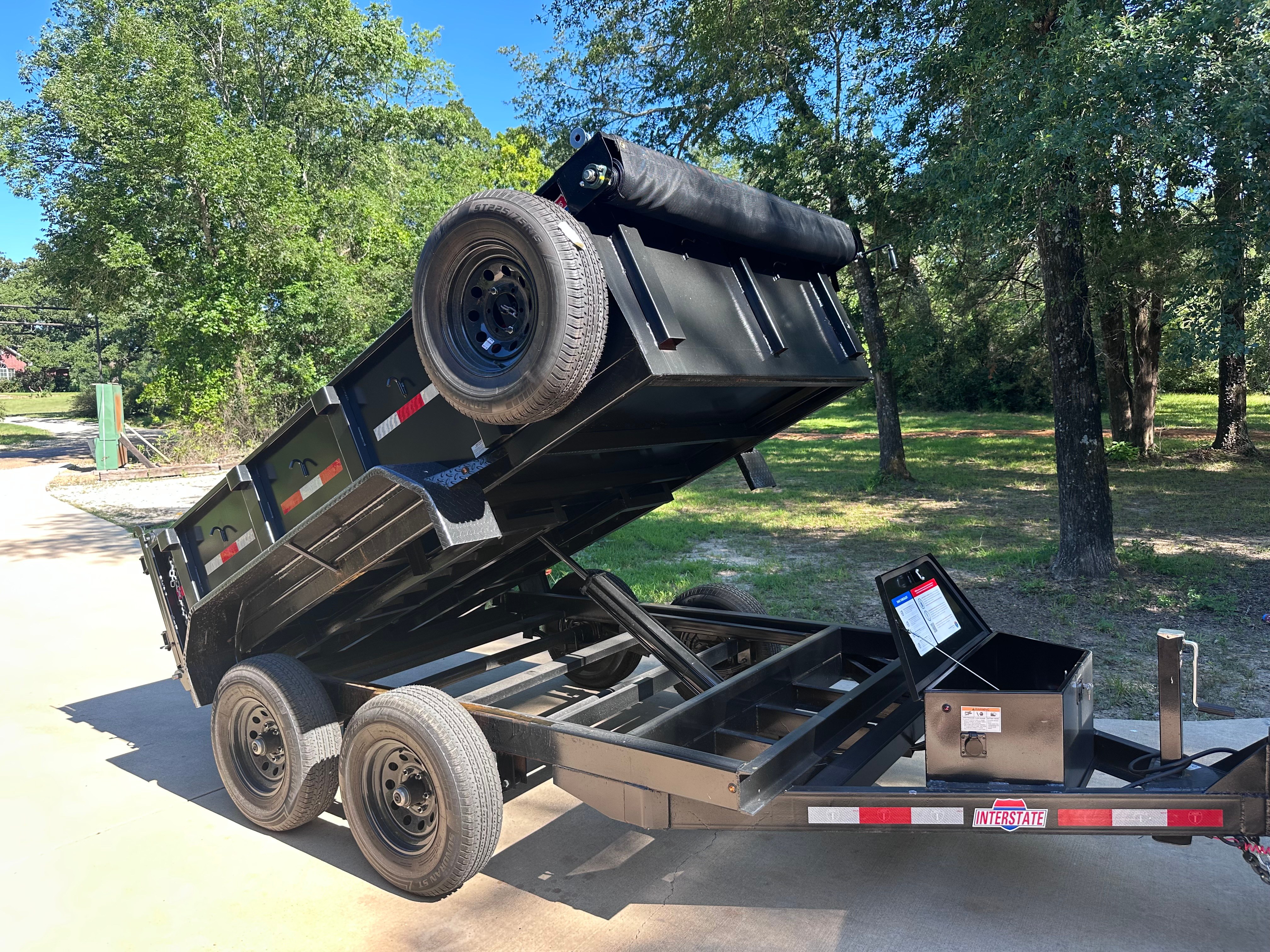 6ft by 10ft hydraulic dump trailer for rent in Kemp TX — tandem axle